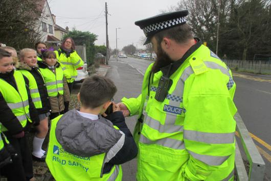 not sure if policeman's number on shoulder is allowed in the photo.JPG