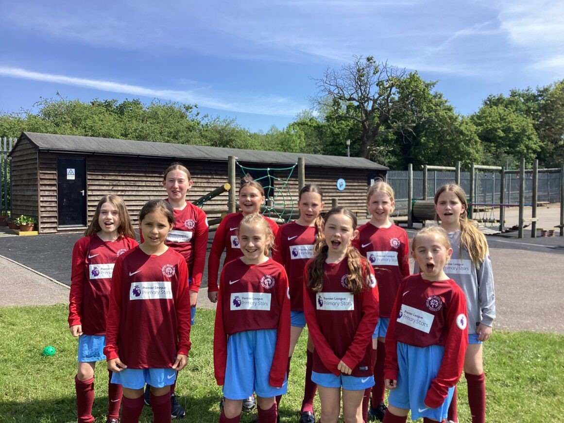 Year 5-6 Girls Football Team Summer 2024.jpg